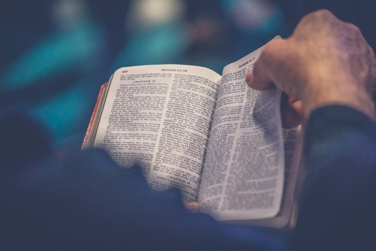 An open Bible resting on a table.